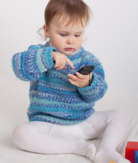 Baby playing with phone